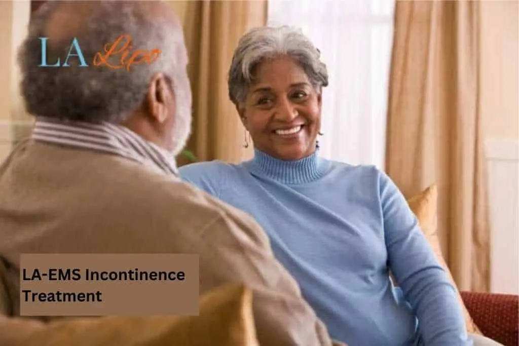 Couple sat smiling at each other - LA-EMS treatment Upper Walthamstow
